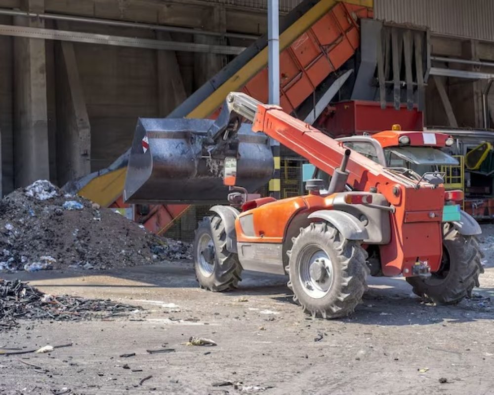 imgi_1_loader-transporting-soil-waste-materials-waste-treatment-plant_181624-47747